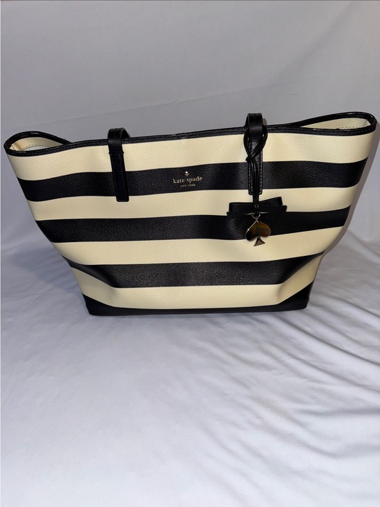 kate spade Handbags - kate spade Black and White Striped Leather Tote with Bow Charm